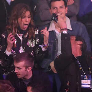 Laury Thilleman, avec à ses côtés son compagnon Juan Arbelaez, fait la folle avec Jean-Luc Reichmann en train de la filmer lors du match d'ouverture du Mondial de handball 2017, France-Brésil (31-16), à l'AccorHotels Arena à Paris le 11 janvier 2017. © Cyril Moreau/Bestimage