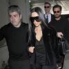 Kim Kardashian à l'aéroport LAX à Los Angeles, porte des lunettes de soleil Rick Owens, une veste Pony, un jogging YEEZY x adidas (modèle 'Calabasas', collection YEEZY Season 4) et des bottines YEEZY (collection YEEZY Season 4). Le 11 janvier 2017.