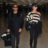 Exclusif - John Legend et sa femme Chrissy Teigen, habillée d'un pull ATM Anthony Thomas Melillo, d'un jean Frame et de chaussures Isabel Marant, arrivent à l'aéroport de Washington. Le 6 janvier 2017.