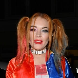 Lindsay Lohan (déguisée en Harley Quinn du film Suicid Squad) arrive à une fête d'Halloween à Londres, le 31 octobre 2016.