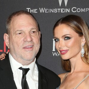 Harvey Weinstein et sa femme Georgina Chapman au photocall de l'afterparty Weinstein Company et Netflix après les Golden Globes au Beverly Hilton de Los Angeles le 8 janvier 2017.
