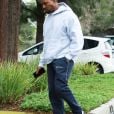 Kanye West arrive sous la pluie à son bureau à Calabasas, le 6 février 2017