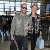 Rosie Huntington-Whiteley et son compagnon Jason Statham arrivent à l'aéroport LAX de Los Angeles pour prendre un avion. Le 23 juillet 2015