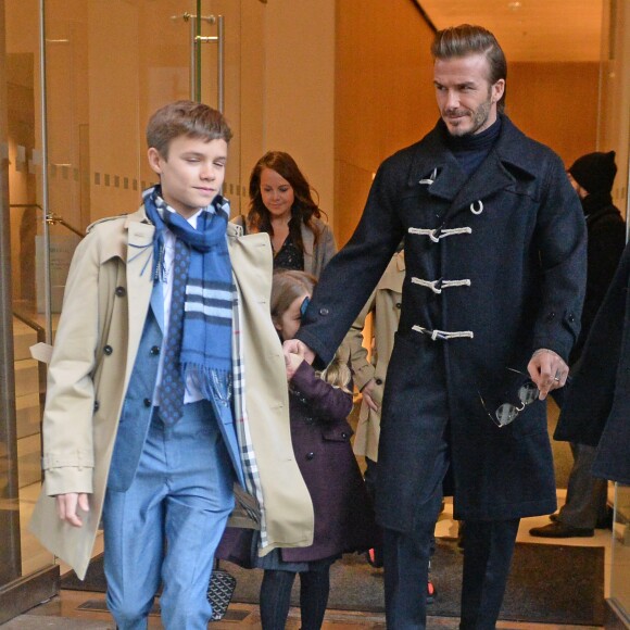 David Beckham sortant de son hôtel avec ses enfants Brooklyn, Romeo, Cruz et Harper, à New York le 12 février 2017