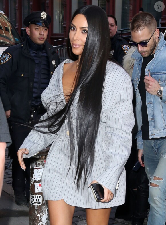 Kim Kardashian et son attaché de presse Simon Huck se baladent dans les rues de New York, le 14 février 2014