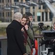 Richard Curtis, Thomas Brodie-Sangster, Liam Neeson sur le tournage de la suite de Love Actually pour le Comedy Relief and Red Nose Day à Londres le 16 février 2017.