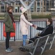 Thomas Brodie-Sangster, Liam Neeson, Olivia Olson sur le tournage de la suite de Love Actually pour le Comedy Relief and Red Nose Day à Londres le 16 février 2017.