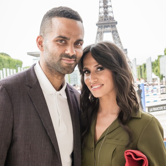 Exclusif - Tony Parker et sa femme Axelle Francine - People lors du Longines Paris Eiffel Jumping au Champ-de-Mars à Paris, le 5 juillet 2015.