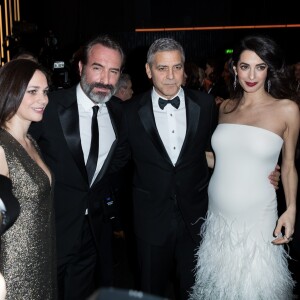 Nathalie Péchalat, Amal Alamuddin Clooney (enceinte) - George Clooney (montre Omega) retrouve son complice Jean Dujardin à la 42ème cérémonie des César à la salle Pleyel à Paris le 24 février 2017. © Olivier Borde / Dominique Jacovides / Bestimage