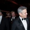 George Clooney (montre Omega) retrouve son complice Jean Dujardin à la 42e cérémonie des César à la salle Pleyel à Paris le 24 février 2017. © Olivier Borde / Dominique Jacovides / Bestimage