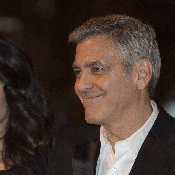 George Clooney et sa femme Amal Alamuddin (enceinte) - Dîner de la cérémonie des César au Fouquet's à Paris. Le 24 février 2017 © Olivier Borde-Dominique Jacovides / Bestimage