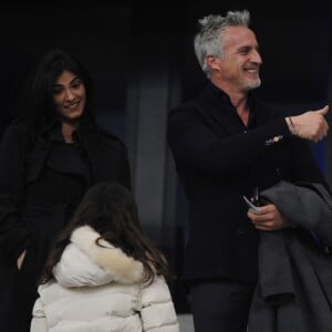 David Ginola et Maeva Denat au match de football entre l'Olympique de Marseille et le Paris-Saint-Germain au stade vélodrome à Marseille le 26 février 2017.