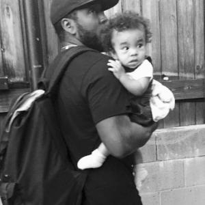 Le cousin de Kanye West, Ricky Anderson, avec son fils Avery le 19 juin 2016