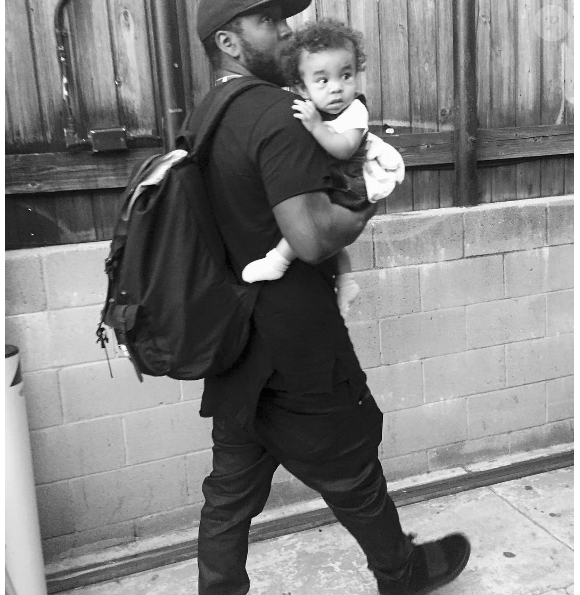 Le cousin de Kanye West, Ricky Anderson, avec son fils Avery le 19 juin 2016