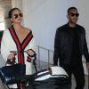 John Legend arrive à l'aéroport de LAX avec sa femme Chrissy Teigen et sa fille Luna à Los Angeles pour prendre l’avion, le 16 mars 2017