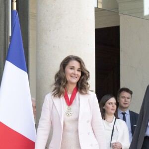 Bill Gates et sa femme Melinda sont reçus à l'Elysée pour être décorés de la plus haute distinction, l'insigne de Commandeur de la Légion d'Honneur. Paris, le 21 avril 2017.