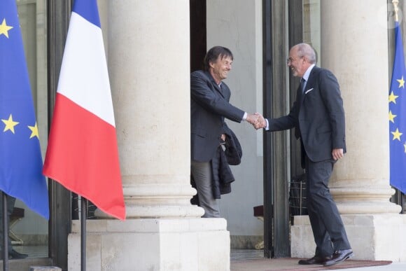Nicolas Hulot et Stéphane Richard à l'Elysée lors de la remise de l'insigne de Commandeur de la Légion d'Honneur à Bill Gates et sa femme Melinda. Paris, le 21 avril 2017.