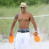 Shemar Moore, très bien entouré, en vacances à Miami le 6 juillet 2014.