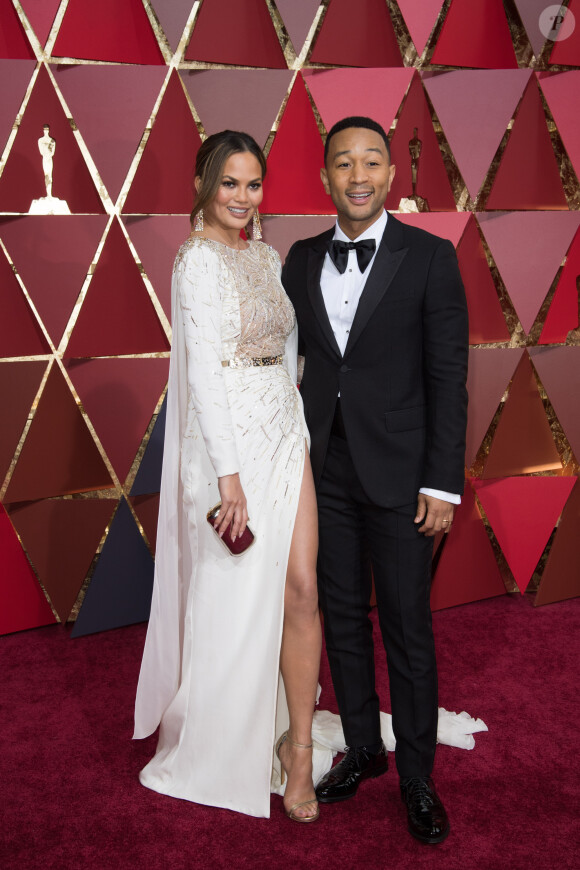 Chrissy Teigen et son mari John Legend à la 89ème cérémonie des Oscars. Los Angeles, le 26 février 2017.