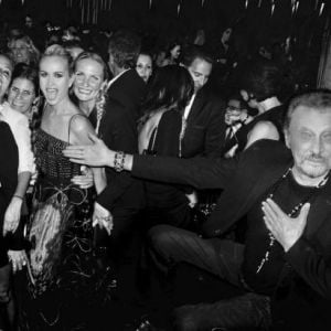 Johnny Hallyday et ses "girls" lors d'une soirée à Los Angeles, en mai 2017