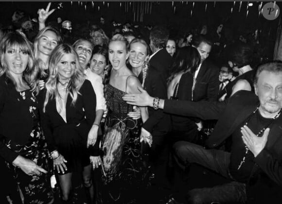 Johnny Hallyday et ses "girls" lors d'une soirée à Los Angeles, en mai 2017