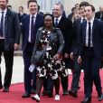 Toute l'équipe d'Emmanuel Macron arrive à l'Elysée pour son investiture, dont sa conseillère Sibeth Ndiaye, chaussée de baskets. Paris, le 14 mai 2017.