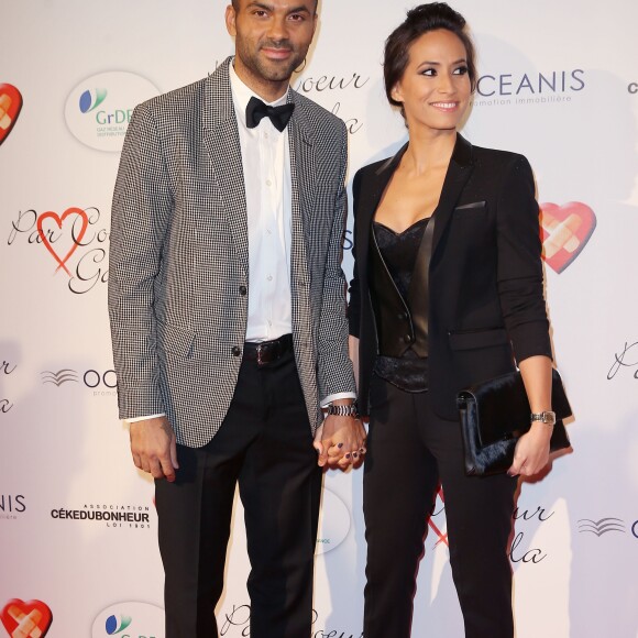 Tony Parker et sa femme Axelle Francine - Personnalités au gala "Par Coeur" pour les 10 ans de l'association "Cekedubonheur" au pavillon d'Armenonville à Paris. Le 24 septembre 2015.