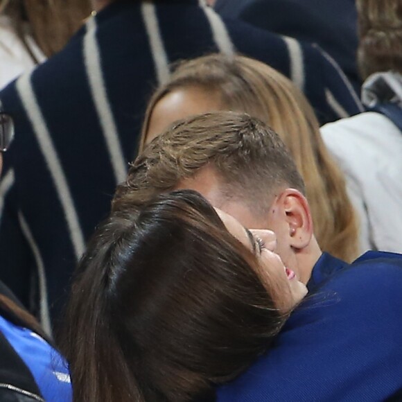 Antoine Griezmann et sa compagne Erika Choperena - Les joueurs retrouvent leur famille dans les tribunes à la fin du match de quart de finale de l'UEFA Euro 2016 France-Islande au Stade de France à Saint-Denis le 3 juillet 2016. © Cyril Moreau / Bestimage