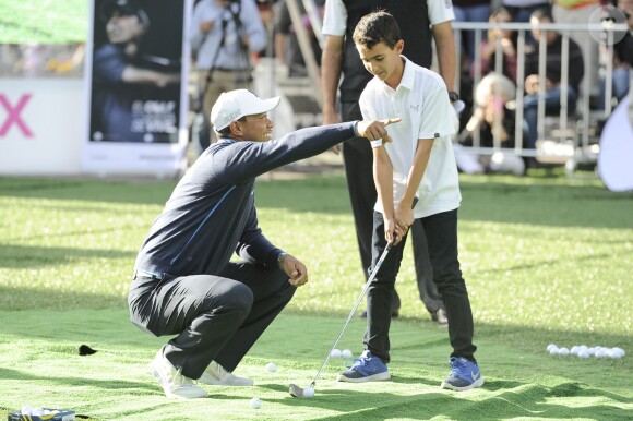 Tiger Woods participe au Golf Clinic for Children à Mexico City le 20 octobre 2015.