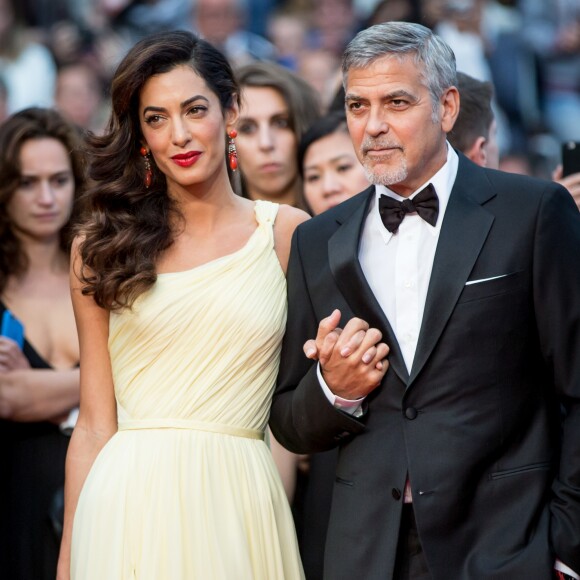 George Clooney et sa femme Amal Alamuddin Clooney (bijoux Cartier) - Montée des marches du film "Money Monster" lors du 69e Festival International du Film de Cannes. Le 12 mai 2016. © Borde-Jacovides-Moreau/Bestimage