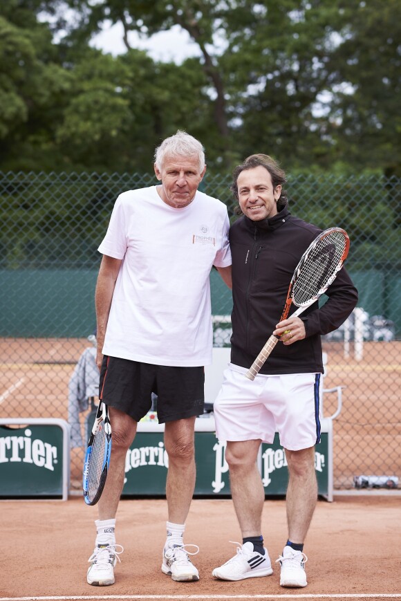 Patrick Poivre d'Arvor et Philippe Candeloro lors de la deuxième journée du Trophée des Personnalités de Roland-Garros le 7 juin 2017.