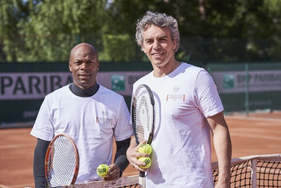 Sylvain Wiltord et françois Trillo lors de la deuxième journée du Trophée des Personnalités de Roland-Garros le 7 juin 2017.