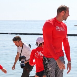 La princesse Charlene de Monaco et Alain Bernard - Journée "Water Safety Day, pour la prévention de la noyade" sur la plage du Larvotto à Monaco le 12 juin 2017.