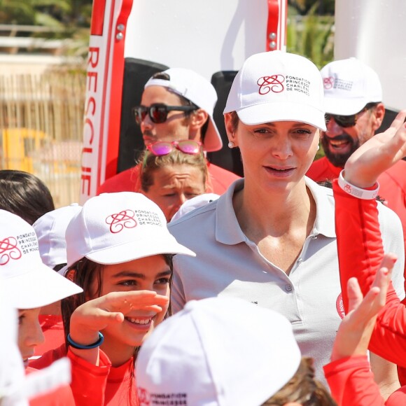 La princesse Charlene de Monaco et Alain Bernard - Journée "Water Safety Day, pour la prévention de la noyade" sur la plage du Larvotto à Monaco le 12 juin 2017.