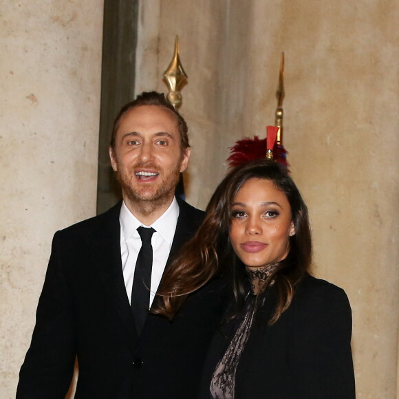 Le DJ David Guetta et sa compagne Jessica Ledon arrivent au dîner d'état donné en l'honneur du président cubain Raul Castro au palais de l'Elysée à Paris, le 1er février 2016. © Dominique Jacovides/Bestimage