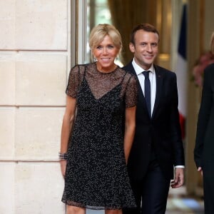 Le Président de la République Française, Emmanuel Macron et sa femme la Première dame Brigitte Macron (Trogneux) lors du dîner d'état en l'honneur du président de la République de Colombie Juan Manuel Santos et sa femme la Première dame Clemencia Rodriguez au Palais de L'Elysée à Paris, France, le 21 juin 2017. © Dominique Jacovides/Bestimage