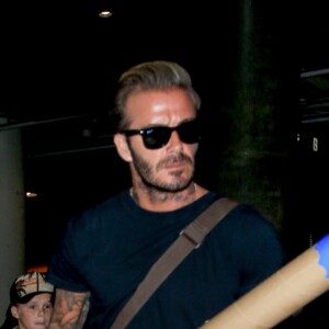 La famille Beckham arrive à l'aéroport de LAX à Los Angeles, le 29 août 2016.