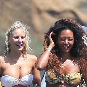 Exclusif - Melanie Brown (Mel B) et son mari Stephen Belafonte en vacances en compagnie de la baby-sitter allemande Lorraine Gilles sur un yacht avec des amis à Ibiza le 3 juillet 2016.