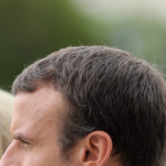 Le président de la République Emmanuel Macron, sa femme Brigitte Macron (Trogneux) lors de la cérémonie d'accueil du président des Etats-Unis à l'Hôtel National des Invalides à Paris le 13 juillet 2017. © Dominique Jacovides/Sébastien Valiela/Bestimage