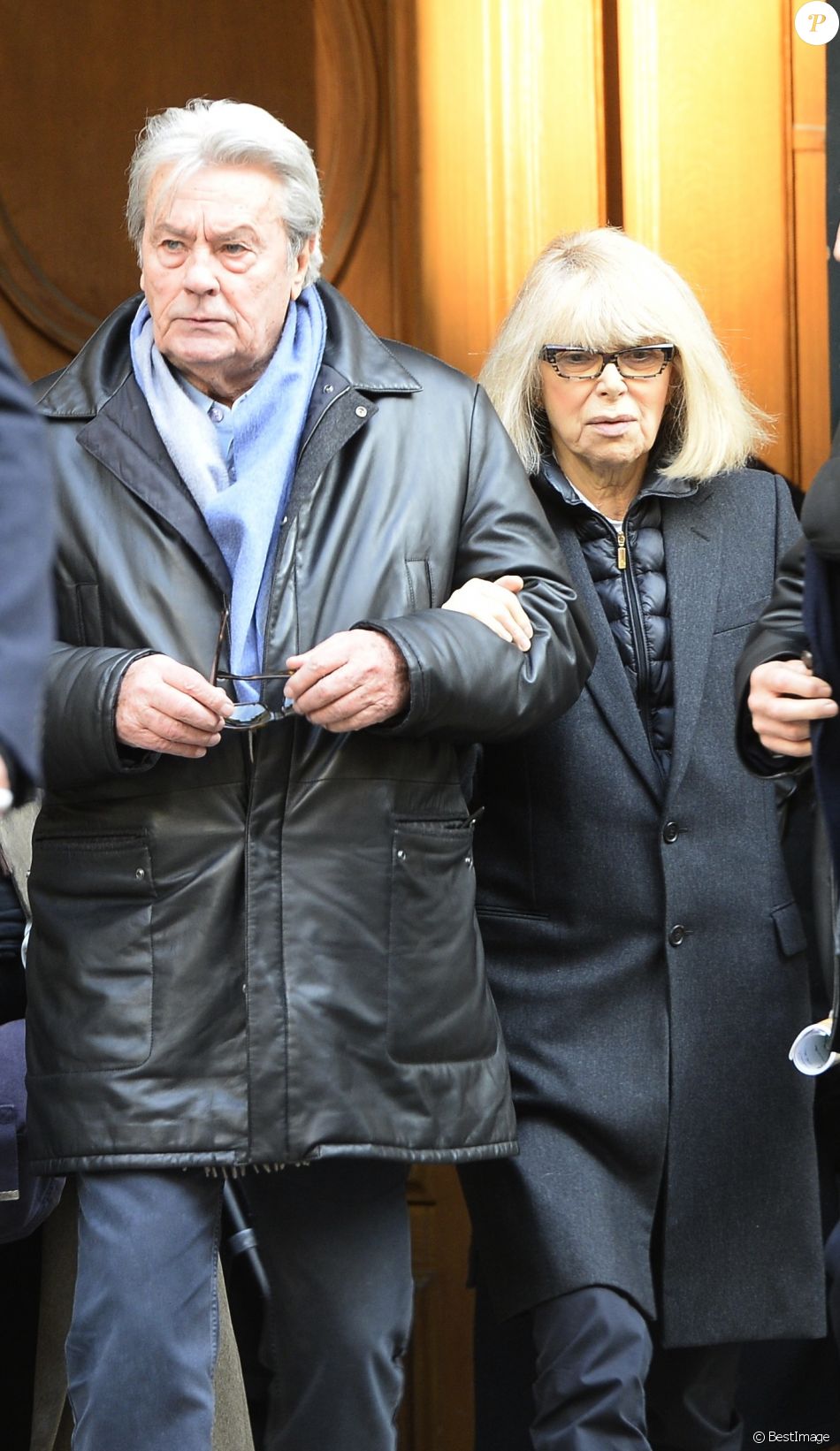 Alain Delon et Mireille Darc - Hommage à Georges Lautner en l&#039;eglise Saint-Roch à Paris. Le 5 décembre 2013