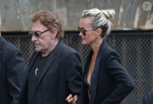 Johnny et Laeticia Hallyday - Obsèques de Mireille Darc en l'église Saint-Sulpice à Paris. Le 1er septembre 2017