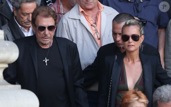 Johnny et Laeticia Hallyday - Sorties des obsèques de Mireille Darc en l'église Saint-Sulpice à Paris. Le 1er septembre 2017