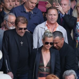 Johnny et Laeticia Hallyday - Sorties des obsèques de Mireille Darc en l'église Saint-Sulpice à Paris. Le 1er septembre 2017