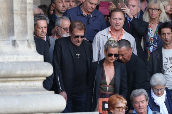 Johnny et Laeticia Hallyday - Sorties des obsèques de Mireille Darc en l'église Saint-Sulpice à Paris. Le 1er septembre 2017