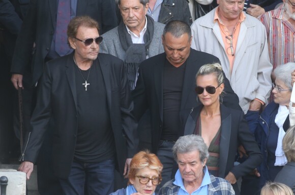 Johnny et Laeticia Hallyday - Sorties des obsèques de Mireille Darc en l'église Saint-Sulpice à Paris. Le 1er septembre 2017