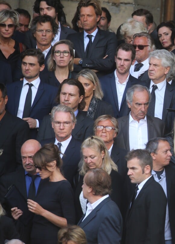 Laurent Delahousse, Guy Martin et sa femme Katherina Marx, Olivier Royant, Carla Bruni - Sorties des obsèques de Mireille Darc en l'église Saint-Sulpice à Paris. Le 1er septembre 2017