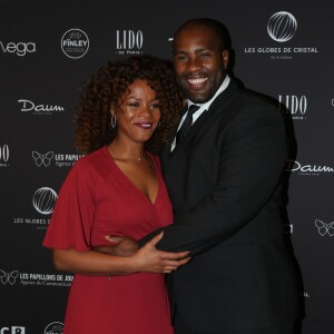 Teddy Riner et sa compagne Luthna Plocus à la 11ème cérémonie des Globes de Cristal au Lido. Paris, le 30 janvier 2017. © CVS / Bestimage