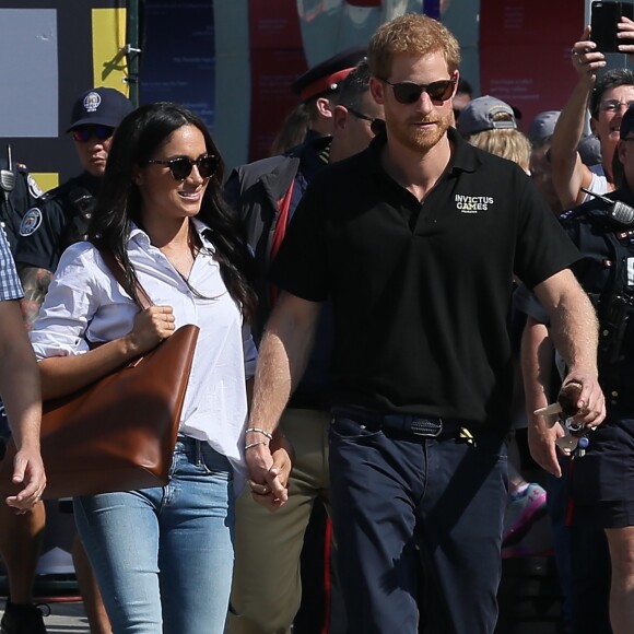 Première apparition officielle du prince Harry et sa compagne Meghan Markle dans les tribunes de la finale de tennis à la troisième édition des Invictus Games à Toronto, le 25 septembre 2017.