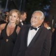 Dominique Strauss Kahn et sa compagne Myriam L'Aouffir sur le tapis rouge lors du 66e Festival du film de Cannes, le 25 mai 2013.