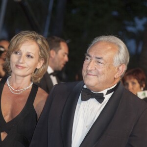Dominique Strauss Kahn et sa compagne Myriam L'Aouffir sur le tapis rouge lors du 66e Festival du film de Cannes, le 25 mai 2013.
